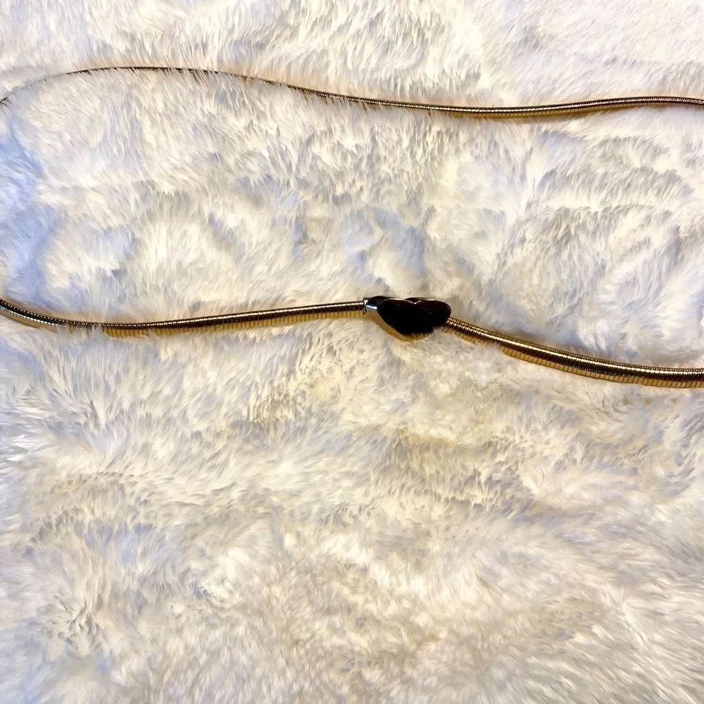EUC vintage slinky gold tone heart buckle women's belt